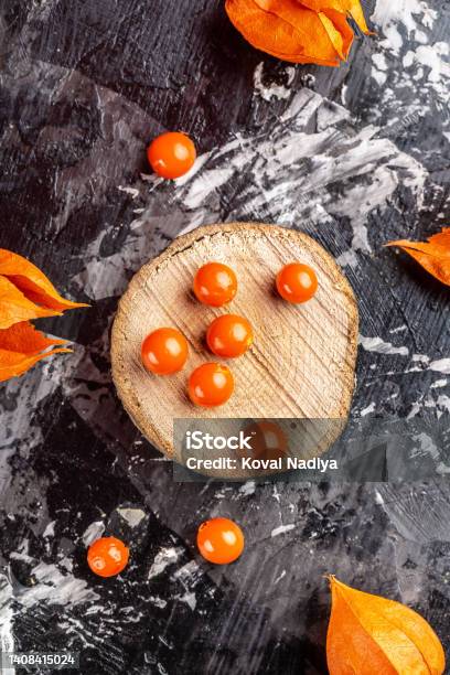Physalis Fruit Physalis Peruviana With Husk On Wooden Background Vertical Image Place For Text Stock Photo - Download Image Now