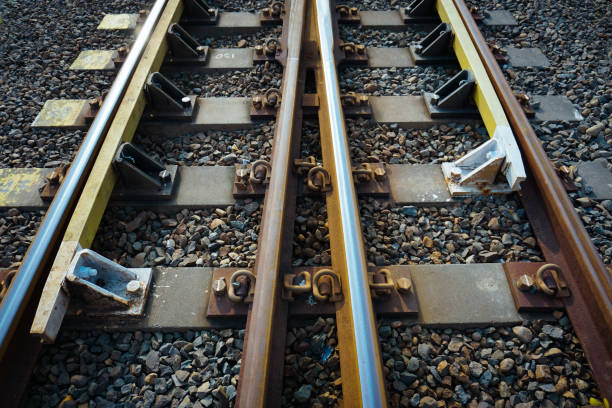 istock rail connection. railroad ties to connect each other. 1408416107