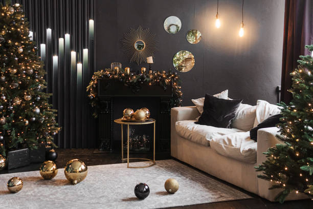 istock Christmas interior with a beautiful Christmas tree, sofa, light bulbs and dark background. 1408416804