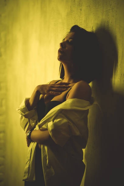 istock Young Woman Leaning On The Wall 1408418436