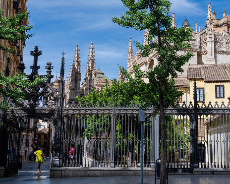 Granada, Spain -- June 5, 2022. A photo taken outside a gated entrance to the Granada Cathedral.
