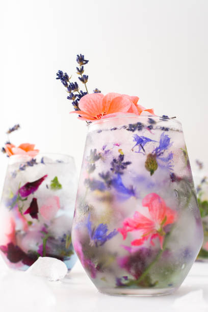 Cold drink with frozen flowers