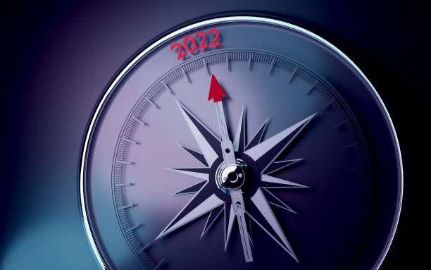 istock 2022 Text is Pointing By A 3D Compass Needle on Blue and Purple Neon Background 1408420203