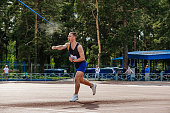 male athlete javelin throwing at competition