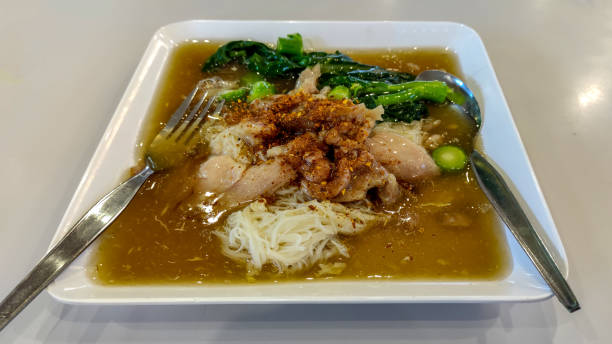 istock Stir-fried Fresh rice-flour noodles in thick sauce 1408428503