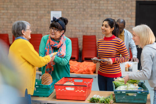 istock Working Together at a Food Drive 1408430359