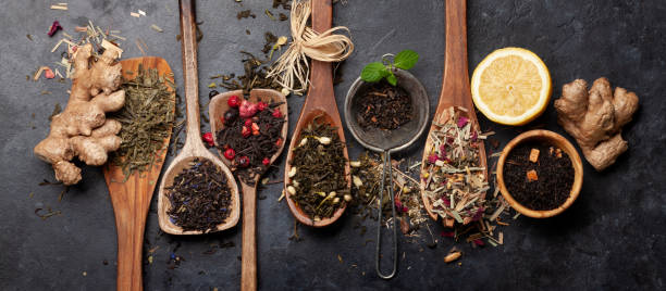 istock Various dried tea in wooden spoons 1408430450