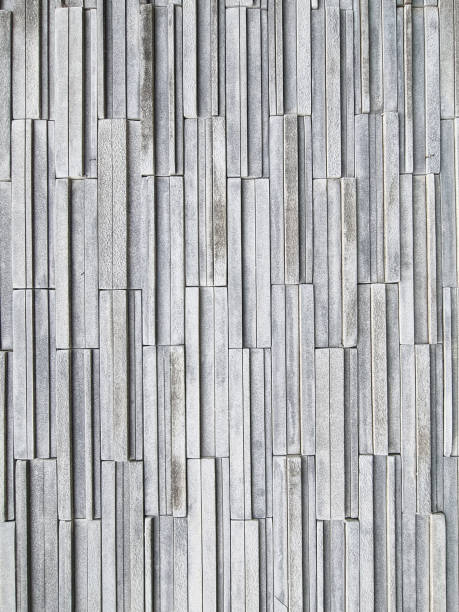 istock Luxury multi layer brick vertical line square shape gray color. strong brickwork wall outdoor house rock. 1408430597