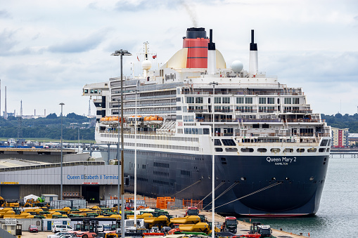 Southampton, UK - 2nd August 2021: The Cunard Line cruise ship Queen Mary Two, at home in the port of Southampton, UK.