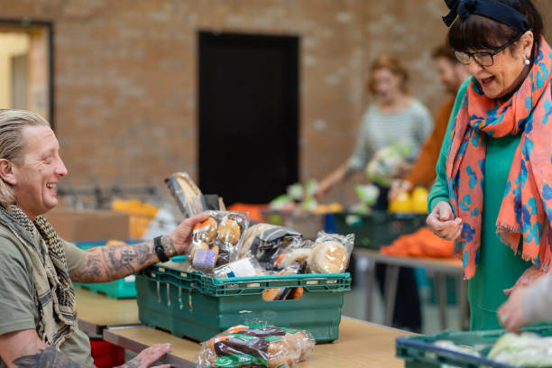 istock Volunteering for a Food Drive 1408432129