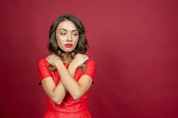 istock Woman frustrated on a red background 1408438986
