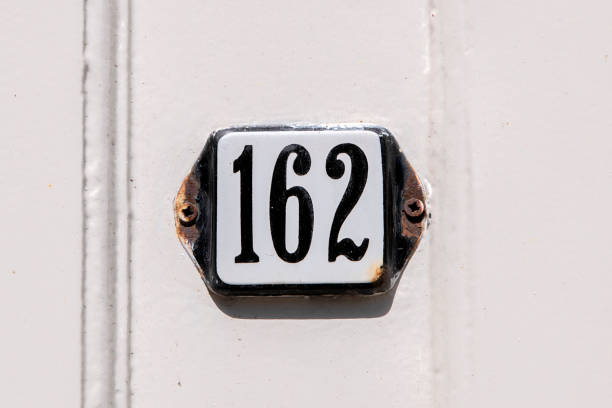 istock Close Up House Number 162 1408440383