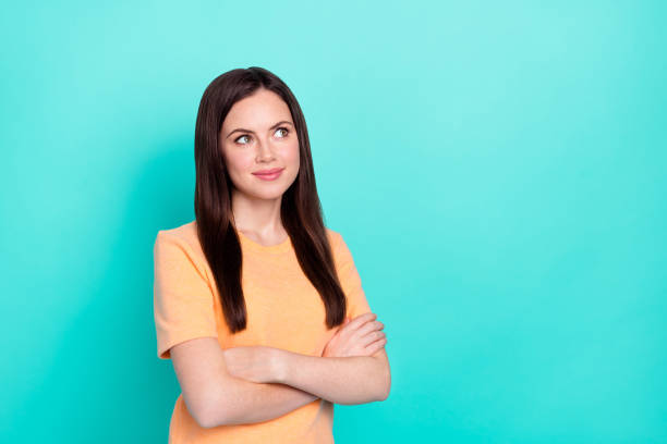 istock Portrait of nice minded lady folded arms look interested empty space isolated on turquoise color background 1408441179