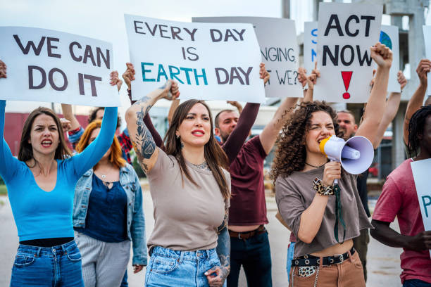 istock Protestors on march against global warming 1408442578