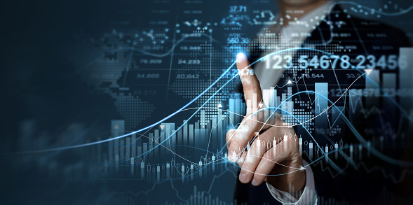 Businessman touches digital screen with growth graph analysing stock market profit. Strategy for growth and success business. Concept of business growth, profit, development and success