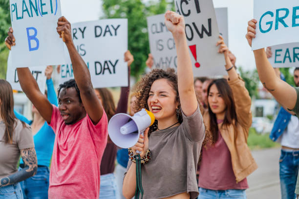 istock People are marching on strike against climate change 1408445282