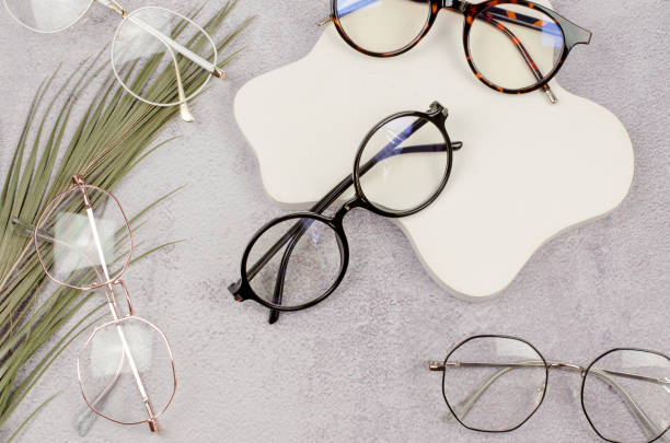 istock Glasses for vision of different types on a concrete background 1408447503