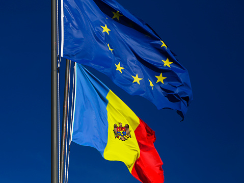 European Union flag with blue sky background in Paris