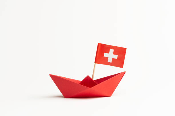 Swiss Flag on the red paper boat.