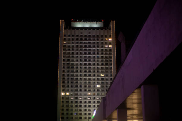 istock Building is at night. Office building with lots of windows. 1408451504
