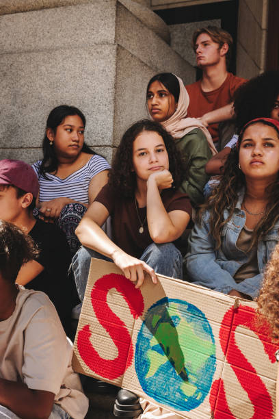 istock Youth activists protesting against climate change and pollution 1408452024
