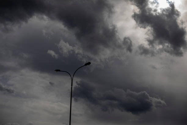istock Light pole against sky. Celestial landscape in cloudy weather. 1408454043