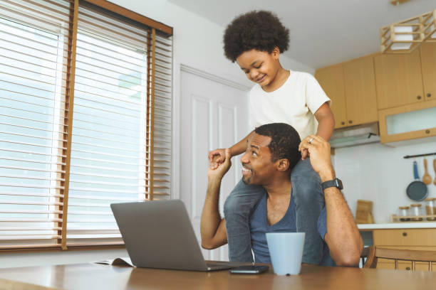 istock African Father playing with his son 1408455327