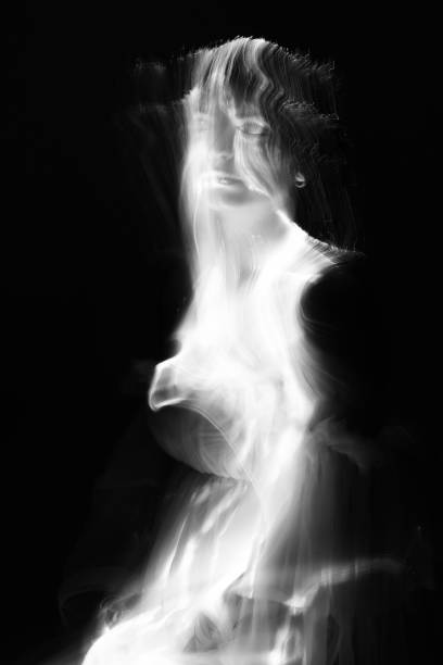 istock Abstract human silhouette in light trails of light painting 1408456972
