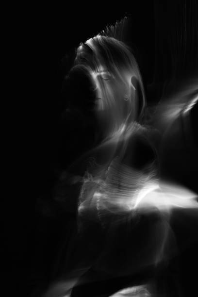 istock Abstract human silhouette in light trails of light painting 1408456973