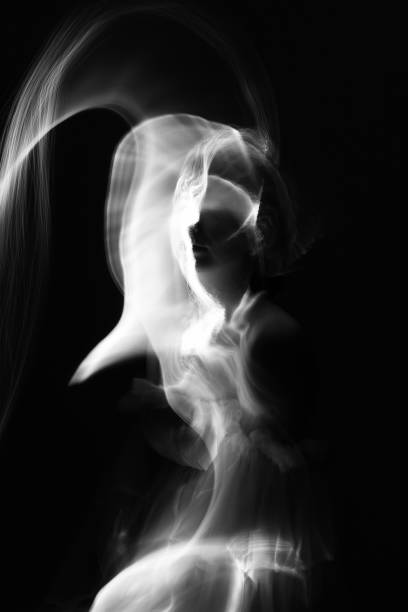 istock Abstract human silhouette in light trails of light painting 1408456977
