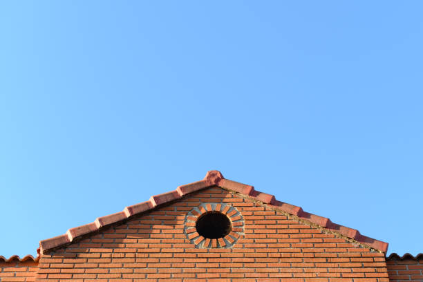 istock Background Brick roof and clear blue sky 1408457376