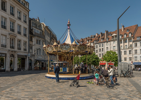 A classic and colorful carousel in Besancon, Francebesancon, france-may 07, 2022: