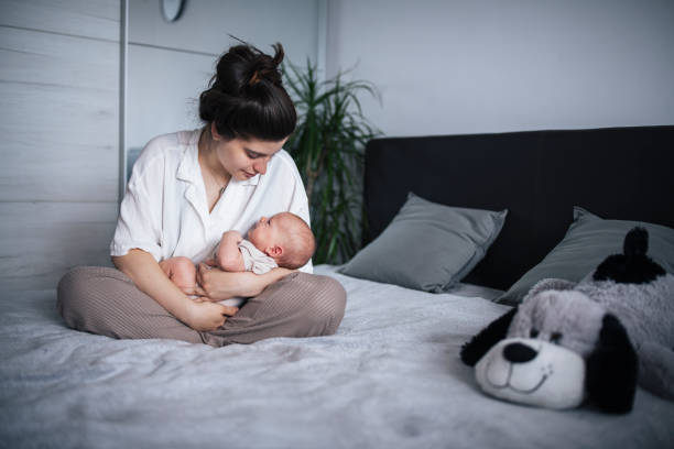 istock Pure love between mother and her baby. 1408460015