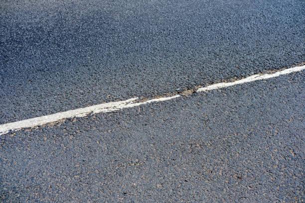 istock Old median strip on the road. 1408460458
