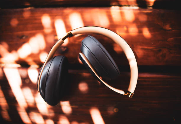 istock Headphones on the table with the sun rays 1408461093