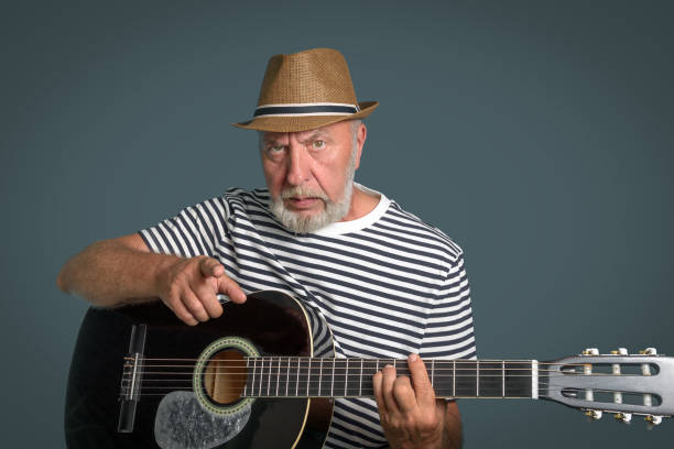 istock An angry music teacher. Learning to play the guitar 1408471620