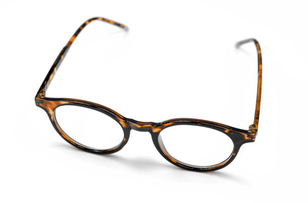 istock Stylish leopard-colored eyeglasses on a white background 1408473731