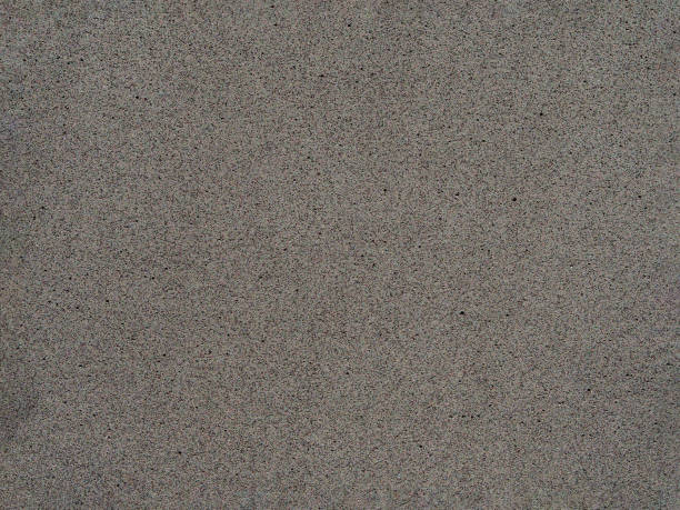 istock Gray granite background surface. Delicate light gray background with speckles. Abstract granite background. Gray background 1408474267