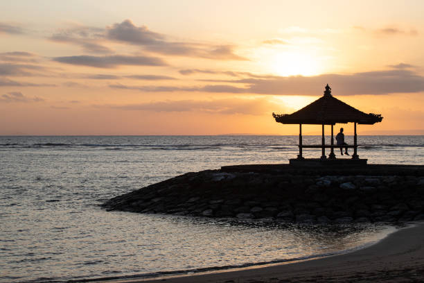 istock Two Nusa Sunrises in Silhouette 1408484364