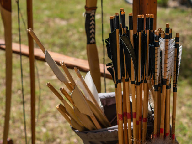 close-up shot medieval bow arrow feathers historical