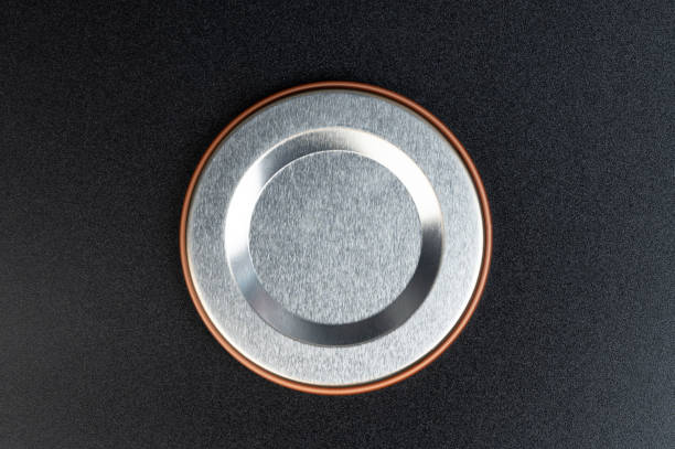 istock Metal shiny circle on black matte background 1408485495