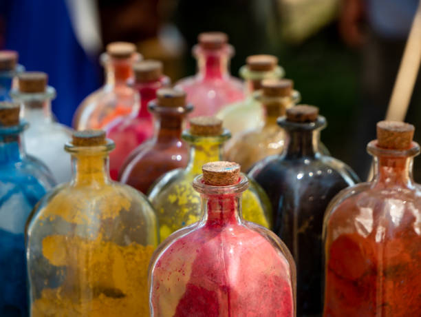 istock glass bottles with cork stopper with powder colors inside 1408485665