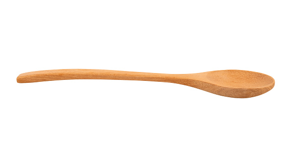 Wooden spoon isolated on white background.