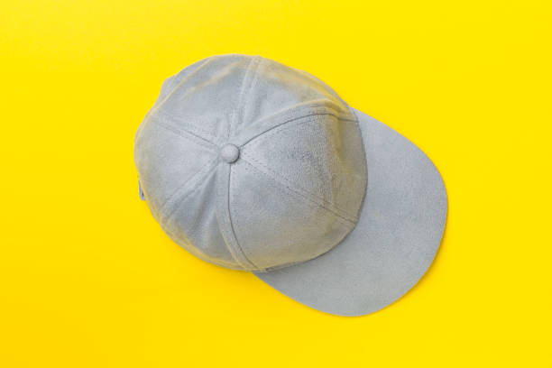 istock Blue cap on color background, top view 1408489378