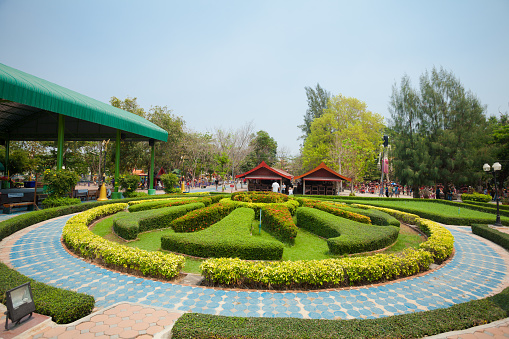 Park of temple grounds Wat Muang. Temple is outside of  Ang Thong with national landmark 96m high Buddha statue of Thailand  in public free ground outside of city. In park are different themes of religion and places with statues