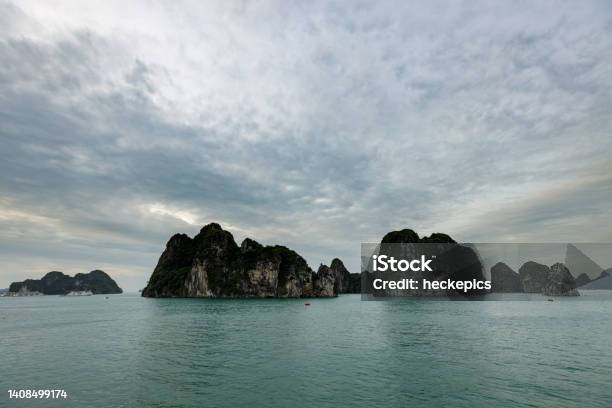 The Island And Rocks Of The Ha Long Bay In Vietnam Stock Photo - Download Image Now - Aerial View, Asia, Bay of Water