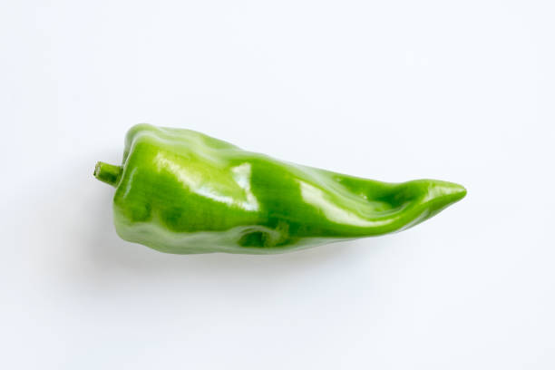 Large, red `Corno di Toro`, or `Bull`s Horn` Italian, sweet peppers isolated on white background.