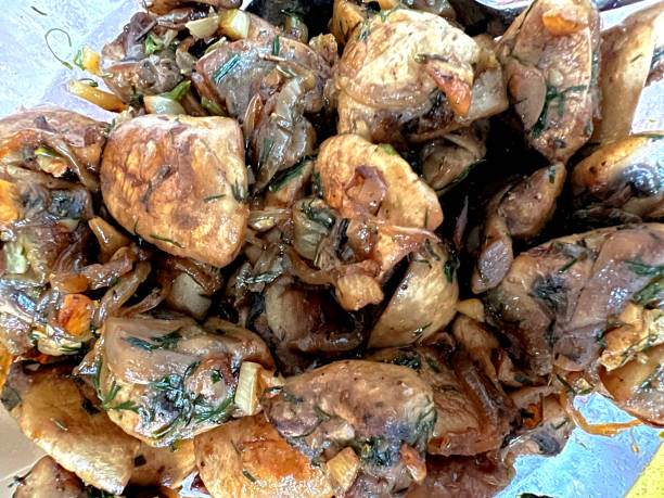 istock Fried mushrooms with onions. 1408500667