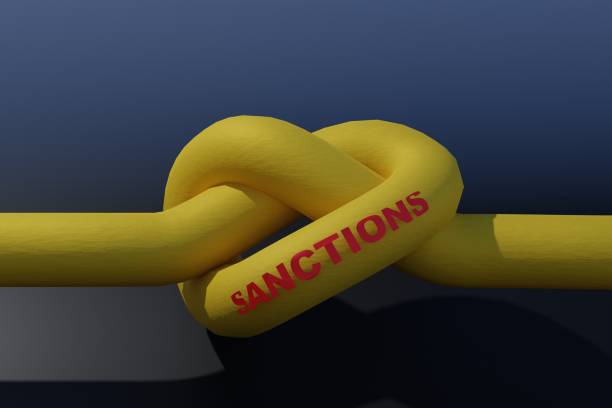 istock Gas sanctions concept. Gas pipe tied in a knot on a dark background. 3D render. 1408503740