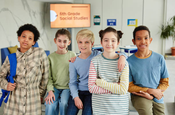 istock Multiethnic Group of Friends in School 1408507460